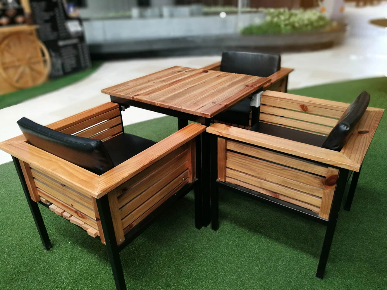 green artificial turf outdoor dining